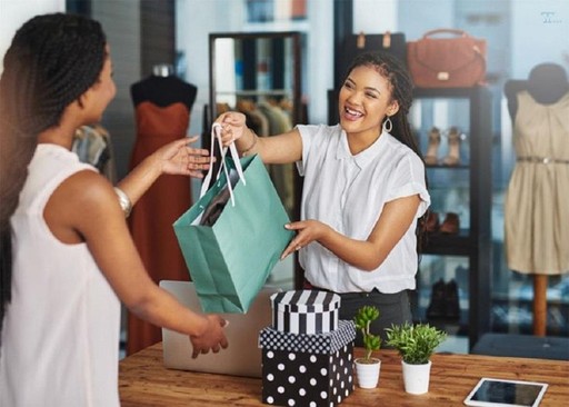A shopper receiving a purchase in store